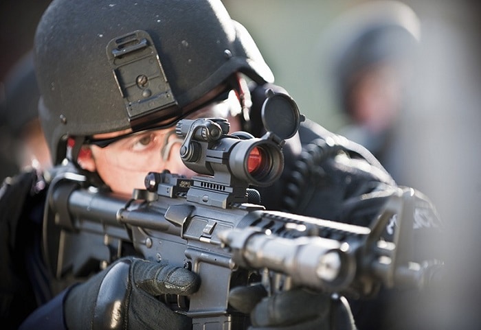 soldier using a Aimpoint PRO Patrol Rifle Optic