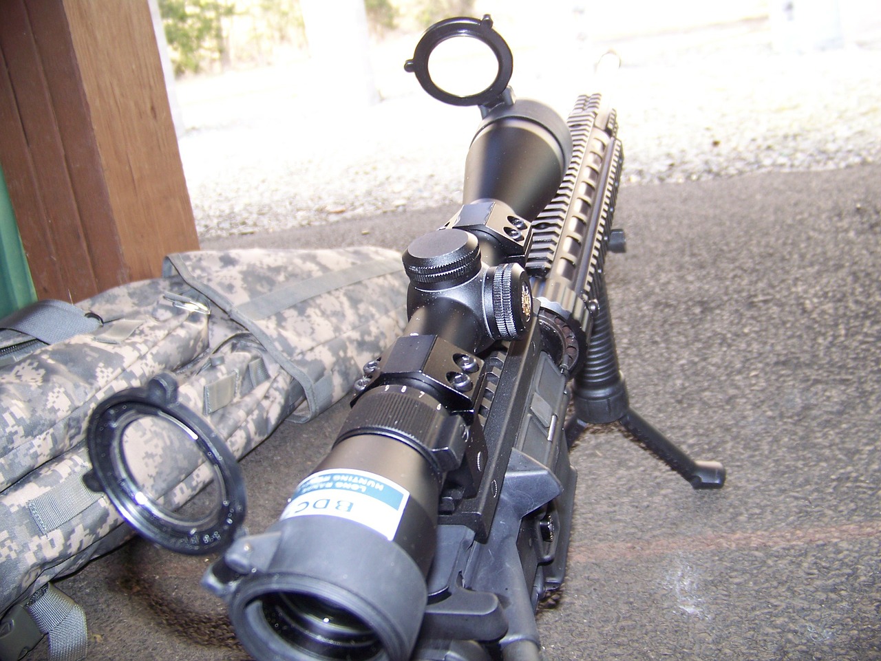 close-up photo of a scope attached to a rifle