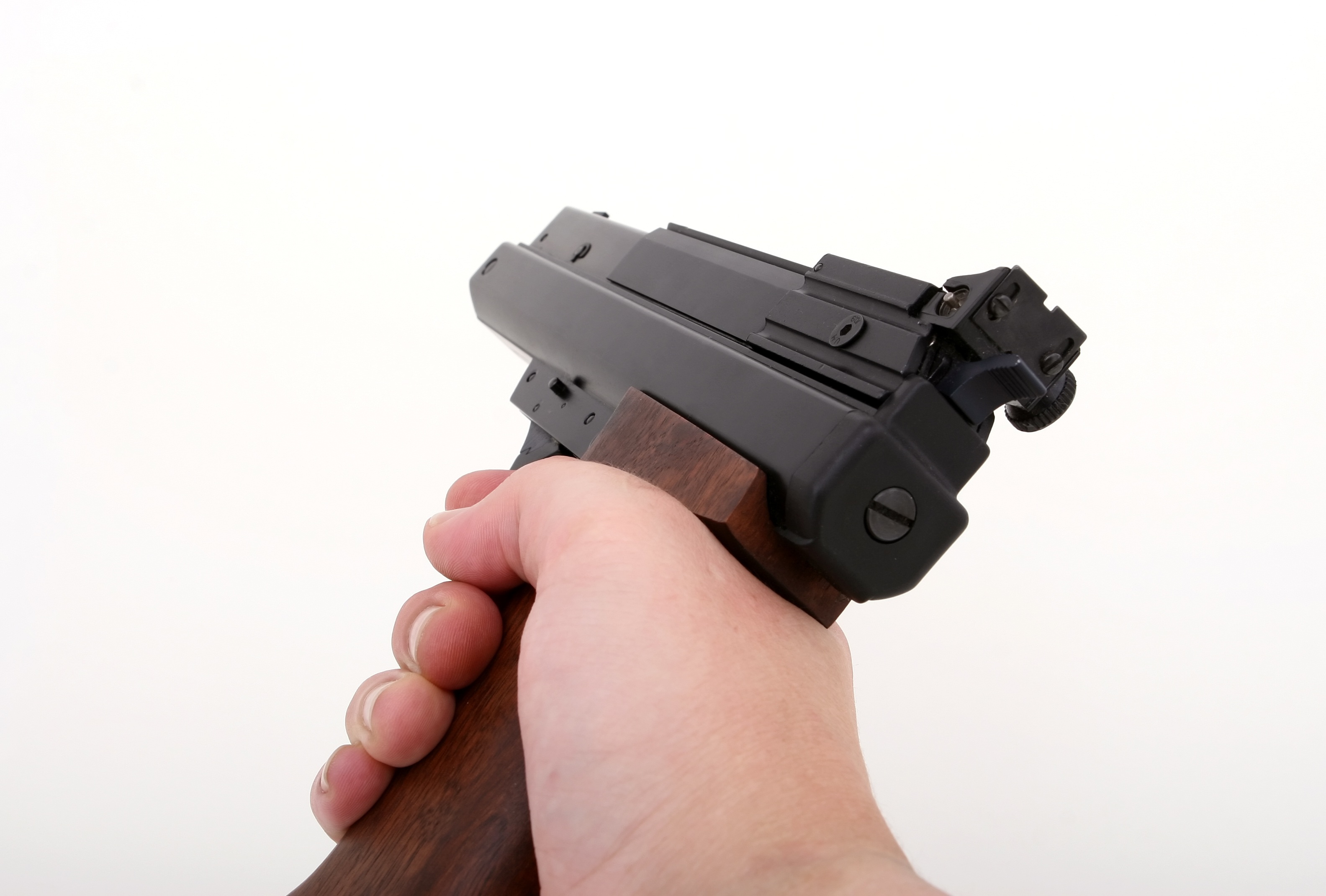 hand holding a pistol